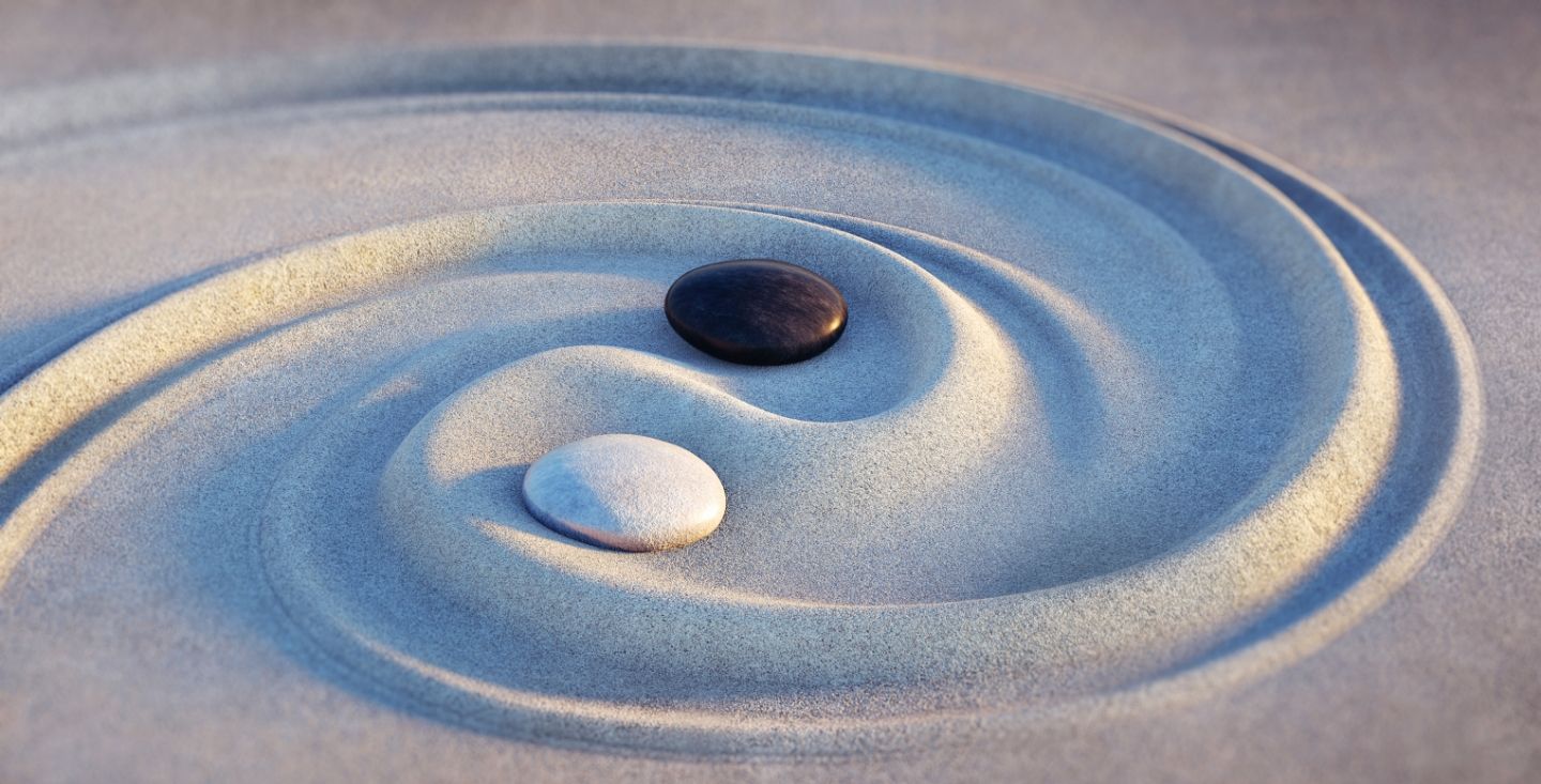 Yin/Yang im Sand